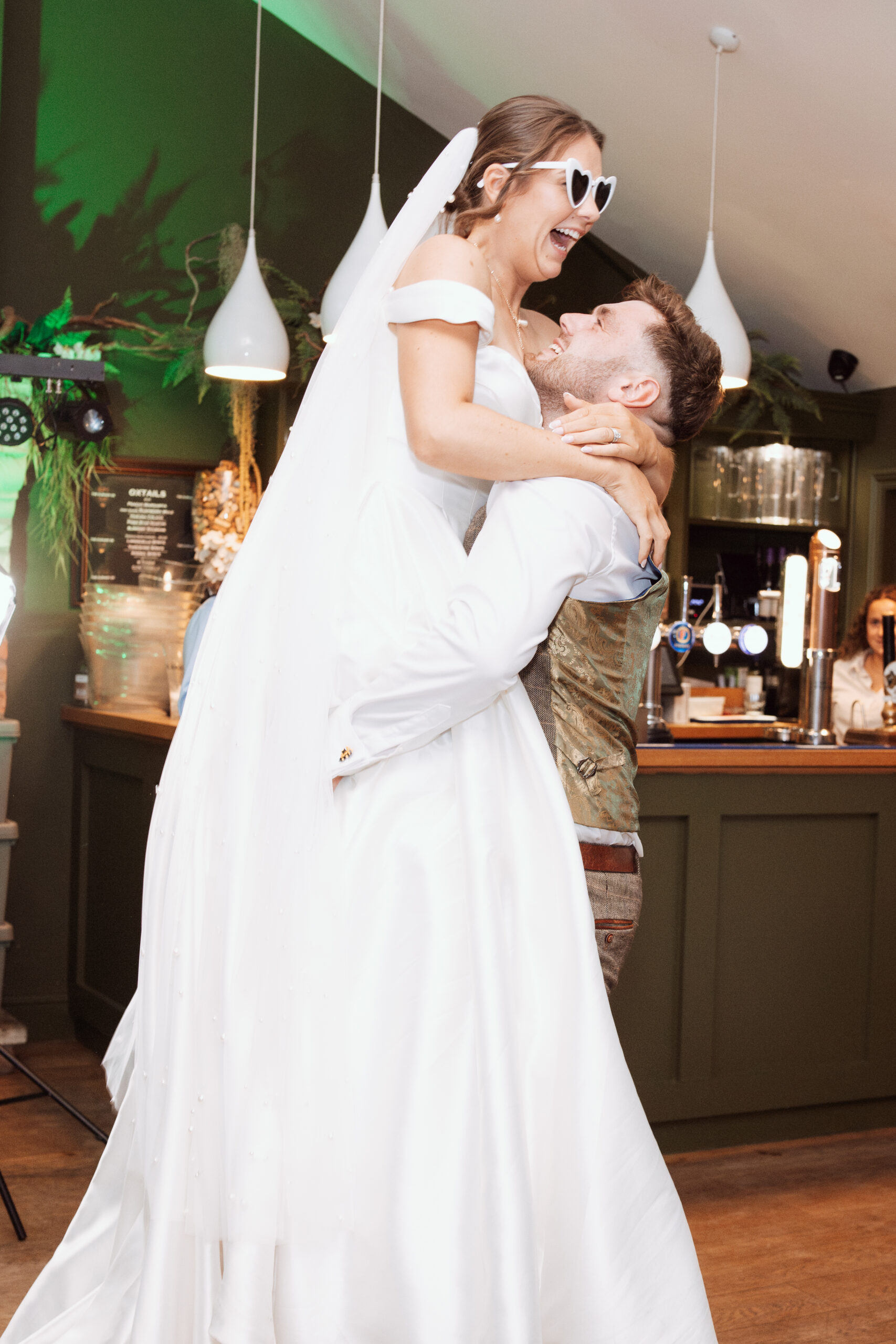 bide and groom on the dancefloor firsr dance as the wedding for wedding photography