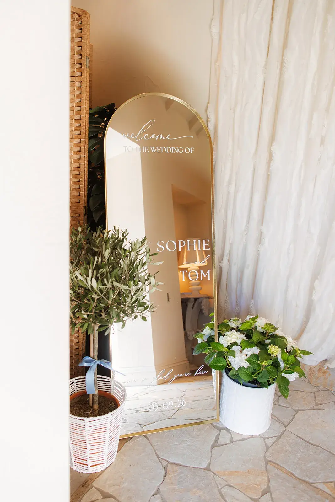 Mirror welcome sign at Sophie and Tom’s Grand Villa Heights wedding