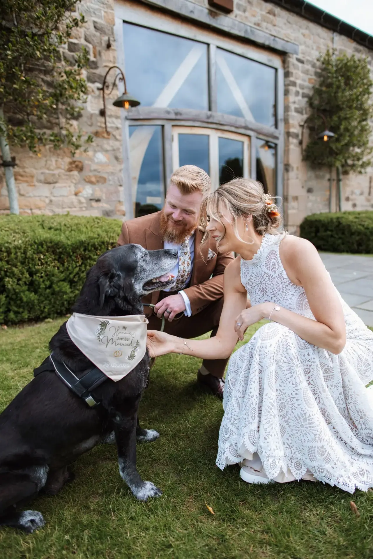 Jack and Katie with their Labrador at their Healey Barn wedding