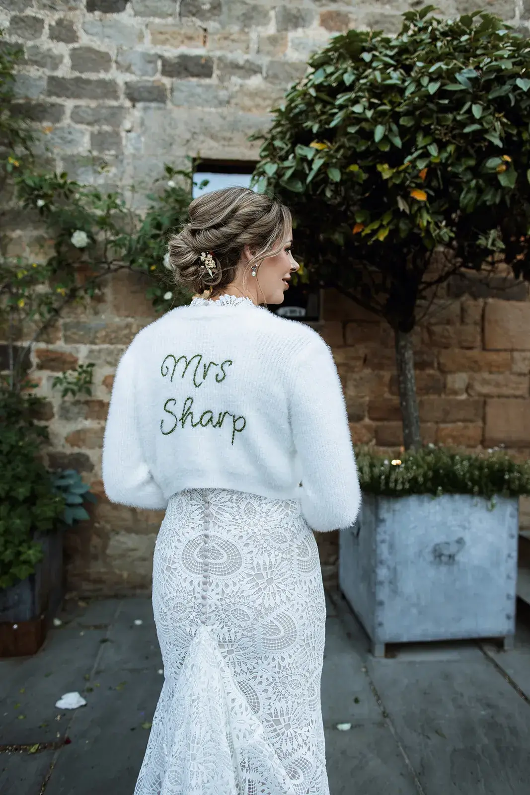 Personalised “Mrs” cardigan at Jack and Katie’s Healey Barn wedding